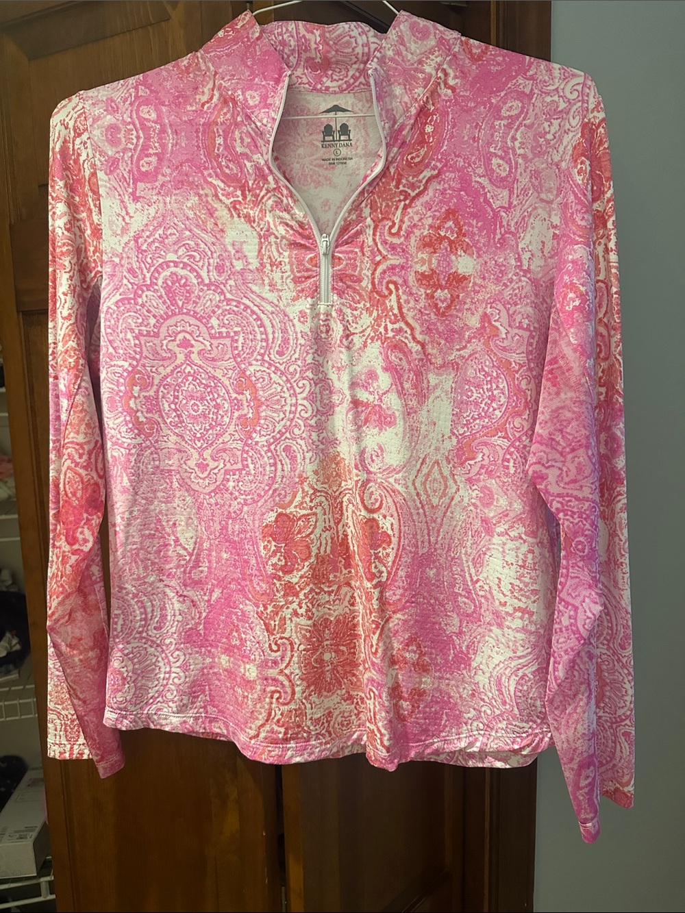 Pink and white  Paisley Quarter-Zip Top with mesh under arms. Never worn.
